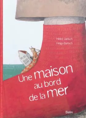 Couverture du produit · Une maison au bord de la mer