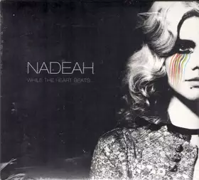 Couverture du produit · While The Heart Beats