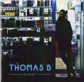 Couverture du produit · Shoot