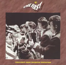 Couverture du produit · The First