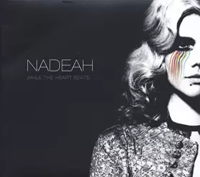 Couverture du produit · While The Heart Beats