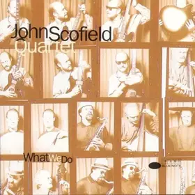 Couverture du produit · What We Do