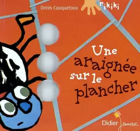 Couverture du produit · Une araignée sur le plancher