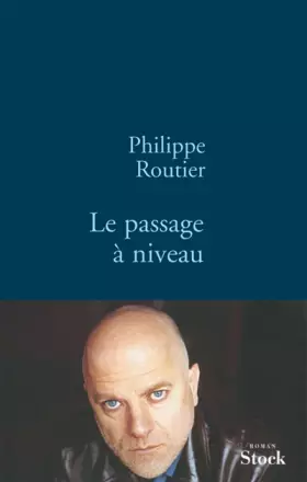 Couverture du produit · Le passage à niveau